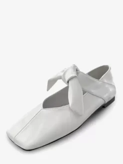 Ballerines dorées à bout carré et détails noués métalliques