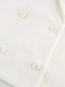 Blazer crème à revers cranté pour femme - Veste oversize à simple boutonnage - Tenue printanière décontractée et minimaliste idéale pour la ville (collection printemps 2026)