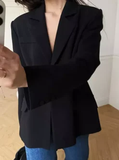 Blazer noir cintré à taille haute et revers cranté pour femme