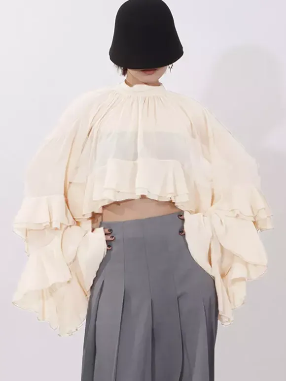 Blouse pour femme couleur saumon à volants plissée col montant manches longues chic