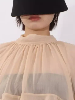 Blouse pour femme couleur saumon à volants plissée col montant manches longues chic