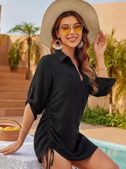 Blouse rose pour femme col rabattu fermeture à lacets et boutons manches 3/4.