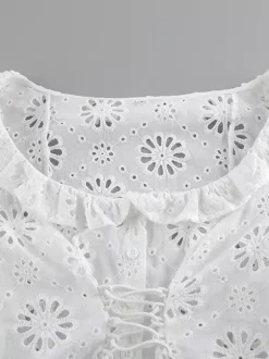 Blouse blanche à lacets pour femme col en V manches courtes en coton chic