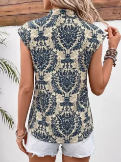Blouse pour femme bleu foncé imprimée à col montant chic sans manches