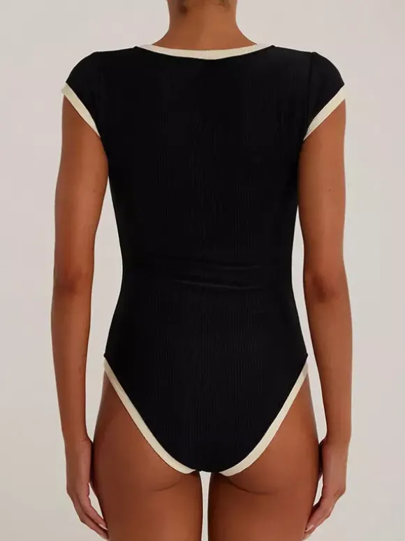 Body à manches courtes noir à col rond et boutons haut de sport pour femme