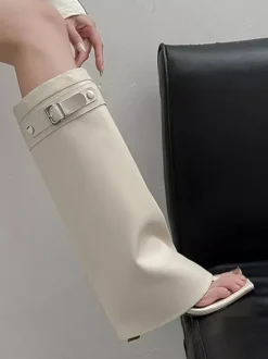 Bottes noires à talons hauts et boucle pour femme