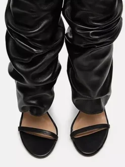 Bottes noires à talons hauts et bout ouvert pour femme