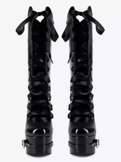 Bottes noires hautes à plateforme et boucle lacets et talons épais