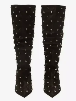 Bottes souples noires en daim à bout pointu et talon épais clouté mi-mollet