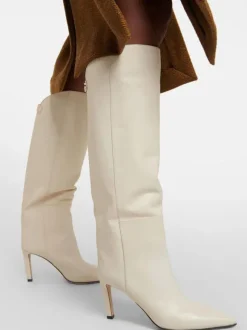 Bottes hautes blanches à bout pointu et talons hauts  bottes larges aux mollets