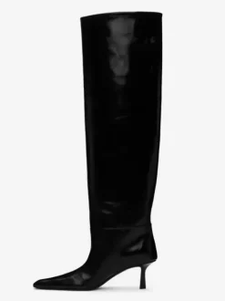 Bottes hautes souples marron à bout pointu et à talons mi-hauts