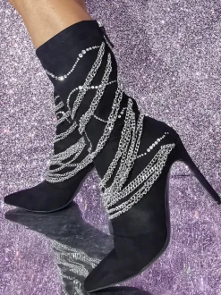 Bottes mi-mollet en daim à bout pointu et talon aiguille avec détail en métal
