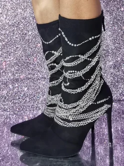 Bottes mi-mollet en daim à bout pointu et talon aiguille avec détail en métal