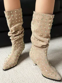 Bottes mi-mollet noires en daim à bout pointu et strass.