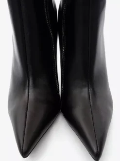 Bottes noires au genou pour femmes bottes à talons hauts à bout pointu et fermeture éclair