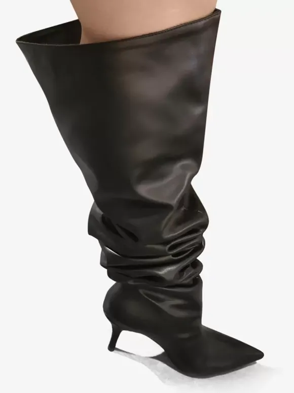 Bottes noires souples à talons hauts et bout pointu