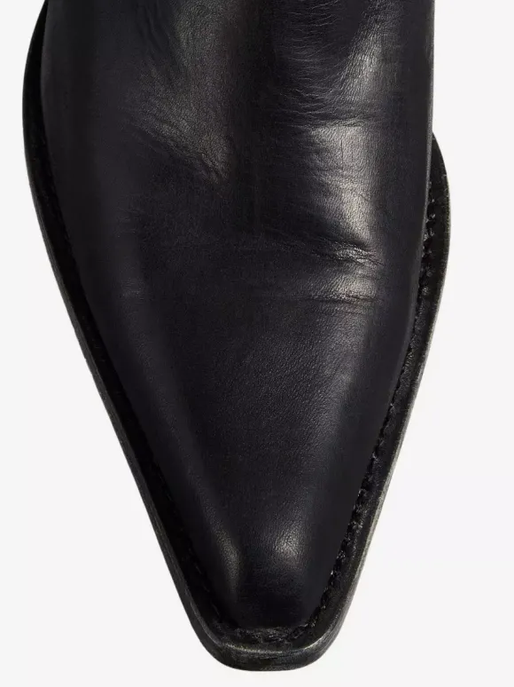 Bottes plates noires à bout pointu et froncées mi-mollet
