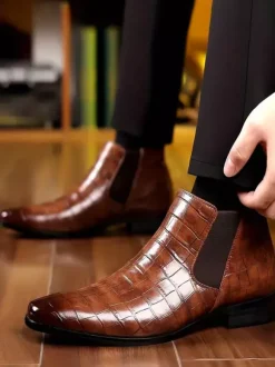 Bottines Chelsea noires à bout rond pour homme motif pierre