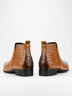 Bottines Chelsea noires à bout rond pour homme motif pierre