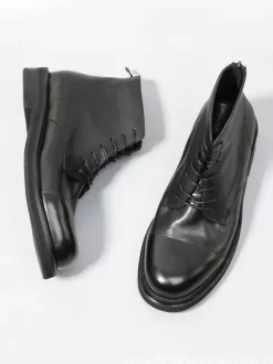 Bottines noires en cuir véritable bout rond lacets et fermeture éclair