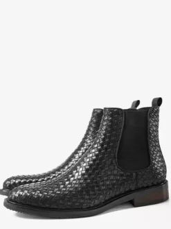 Bottines Chelsea noires pour homme bout rond à enfiler.
