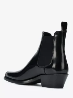 Bottines Chelsea noires pour homme bout carré détails métalliques talon épais
