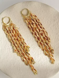 Boucles d'oreilles dorées pour adulte style européen décontracté motif feuille et géométrie. Bijou du quotidien