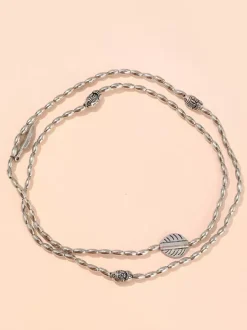 Bracelet de cheville plaqué avec pendentif plume d'inspiration bohème