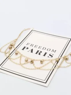 Bracelet de cheville délicat en forme de cloche pour vacances à la plage