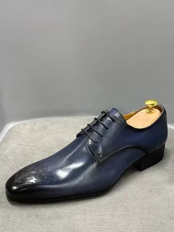 Chaussures habillées pour hommes modernes à bout rond en cuir de vache