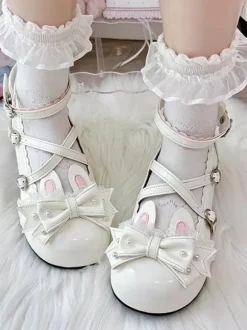 Chaussures Lolita classiques roses à n艙uds et lapins en cuir PU à talons compensés.