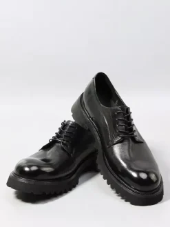 Chaussures noires décontractées en cuir véritable bout rond à lacets