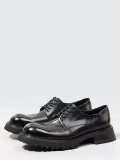 Chaussures noires décontractées en cuir véritable bout rond à lacets