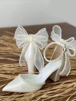 Chaussures de mariage blanches à bout pointu n艙ud perles talon épais