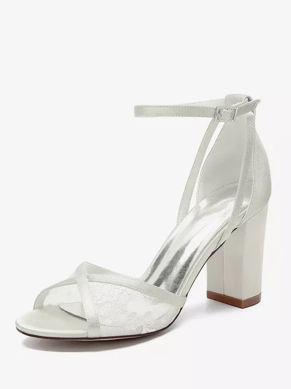 Chaussures de mariage en dentelle ivoire à bout ouvert et talon épais avec bride à la cheville