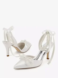 Chaussures de mariage ivoire en satin à bout pointu avec perles et n艙ud à talons hauts