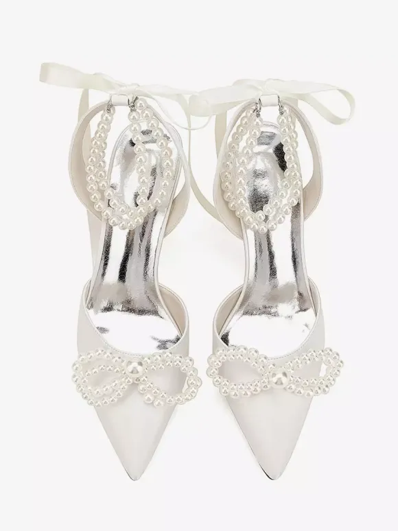 Chaussures de mariage ivoire en satin à bout pointu avec perles et n艙ud à talons hauts