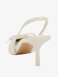 Chaussures habillées noires à talons hauts avec n艙uds et bride arrière à talons aiguilles