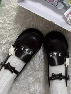 Chaussures Sweet Lolita noires à imprimé étoiles et n艙uds bout rond en cuir PU plates de haute qualité.
