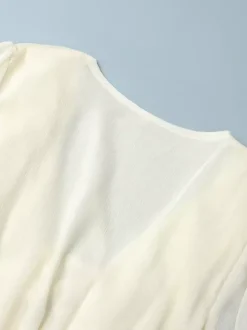 Chemise blanche à volants pour femme col en V manches longues élégantes