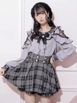 Chemise Lolita en dentelle col rond volants manches longues ruban décoré