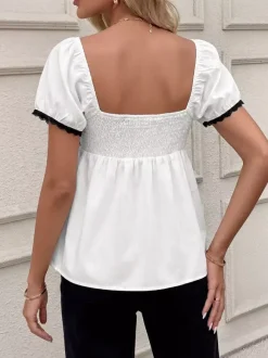 Chemisier péplum à col carré et manches bouffantes noires en dentelle avec n艙ud papillon pour femme