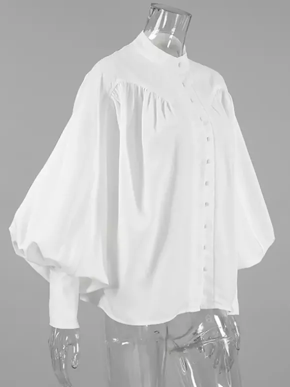 Chemisier vintage à manches bouffantes et col montant pour femme collection automne 2026