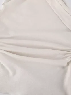 Chemisier asymétrique à une épaule sans manches pour femme froncé sur le côté et drapé.