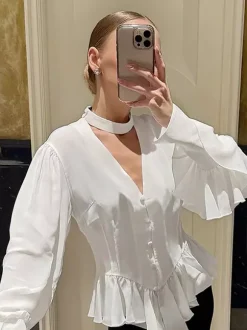 Chemisier péplum blanc élégant pour femme - Col V dos nu manches lanternes coupe ajustée - Idéal pour le printemps et le soir (2026)