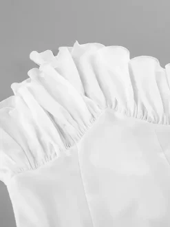 Chemisier péplum blanc élégant pour femme - Col V dos nu manches lanternes coupe ajustée - Idéal pour le printemps et le soir (2026)