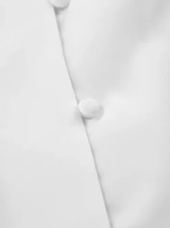 Chemisier péplum blanc élégant pour femme - Col V dos nu manches lanternes coupe ajustée - Idéal pour le printemps et le soir (2026)