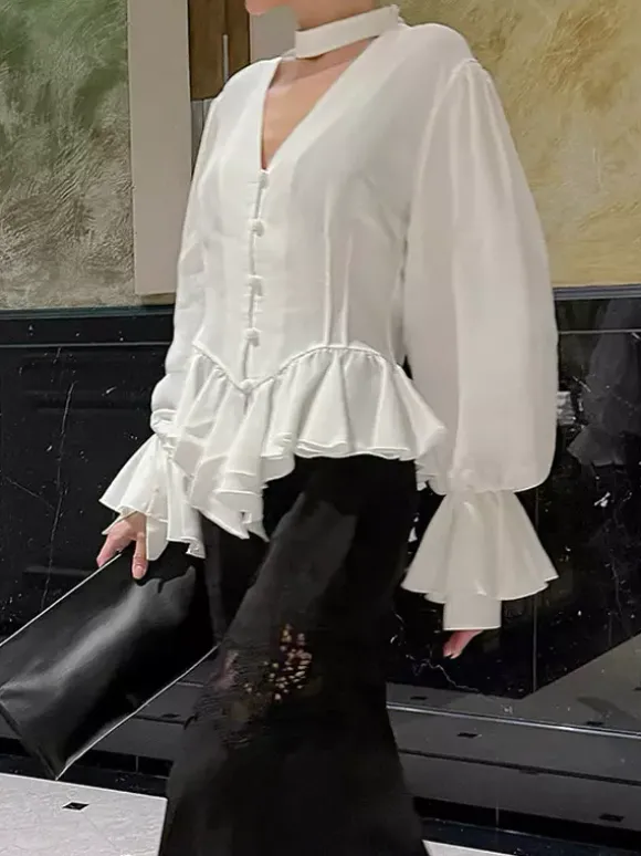 Chemisier péplum blanc élégant pour femme - Col V dos nu manches lanternes coupe ajustée - Idéal pour le printemps et le soir (2026)