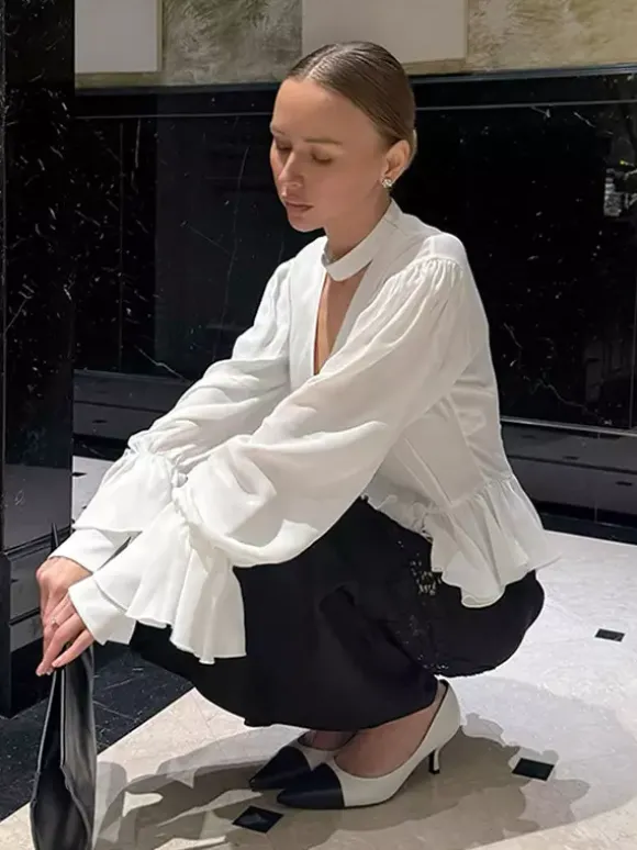 Chemisier péplum blanc élégant pour femme - Col V dos nu manches lanternes coupe ajustée - Idéal pour le printemps et le soir (2026)
