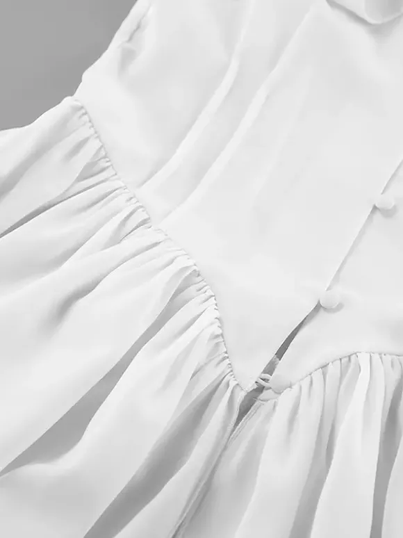 Chemisier péplum blanc élégant pour femme - Col V dos nu manches lanternes coupe ajustée - Idéal pour le printemps et le soir (2026)